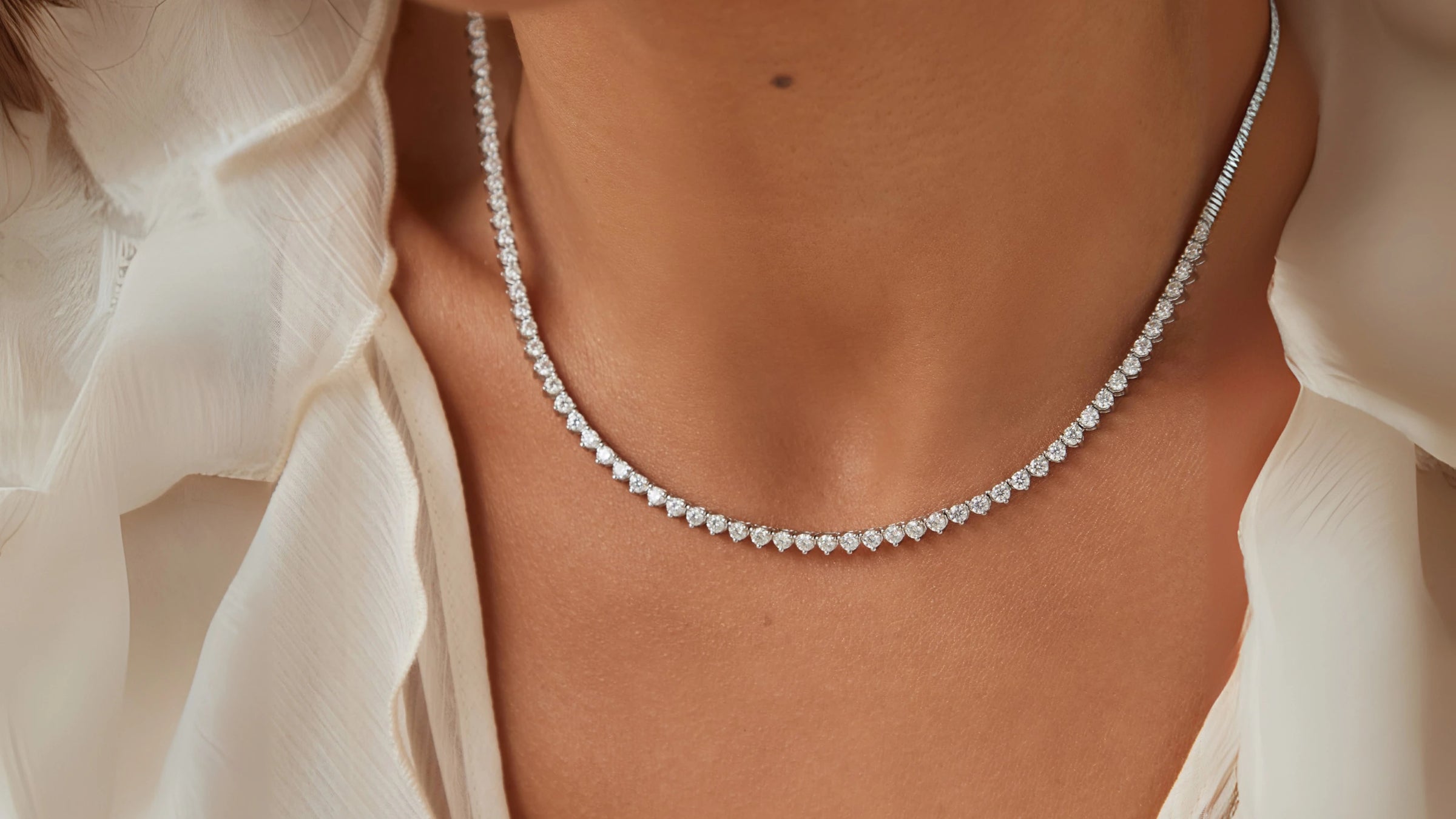 Moissanite necklace worn by an elegant woman