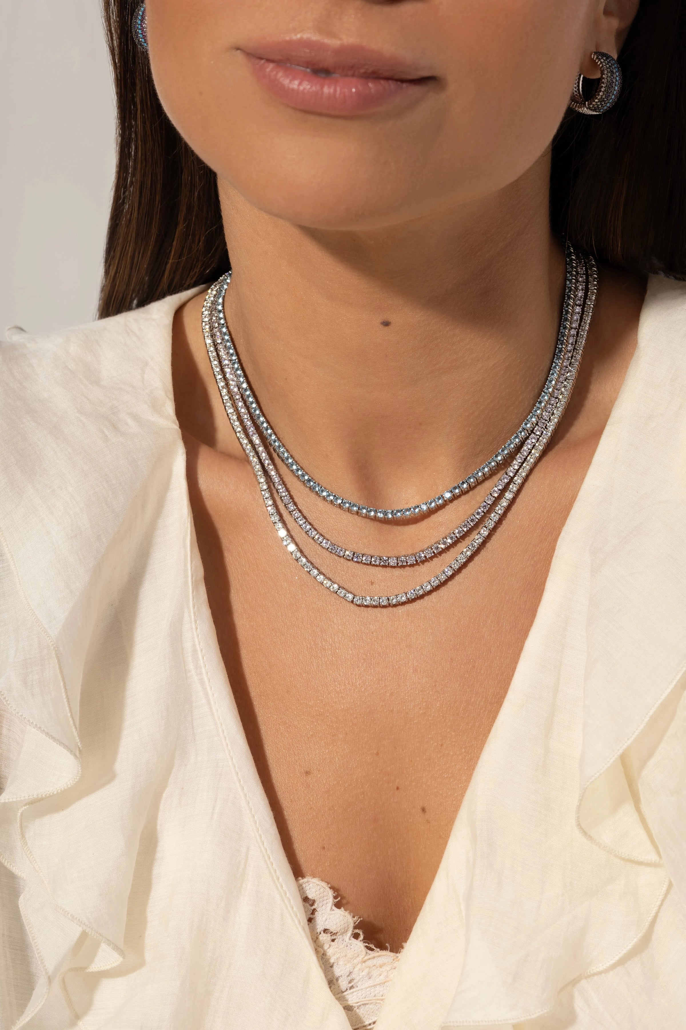 tennis bracelets elegantly styled by a woman