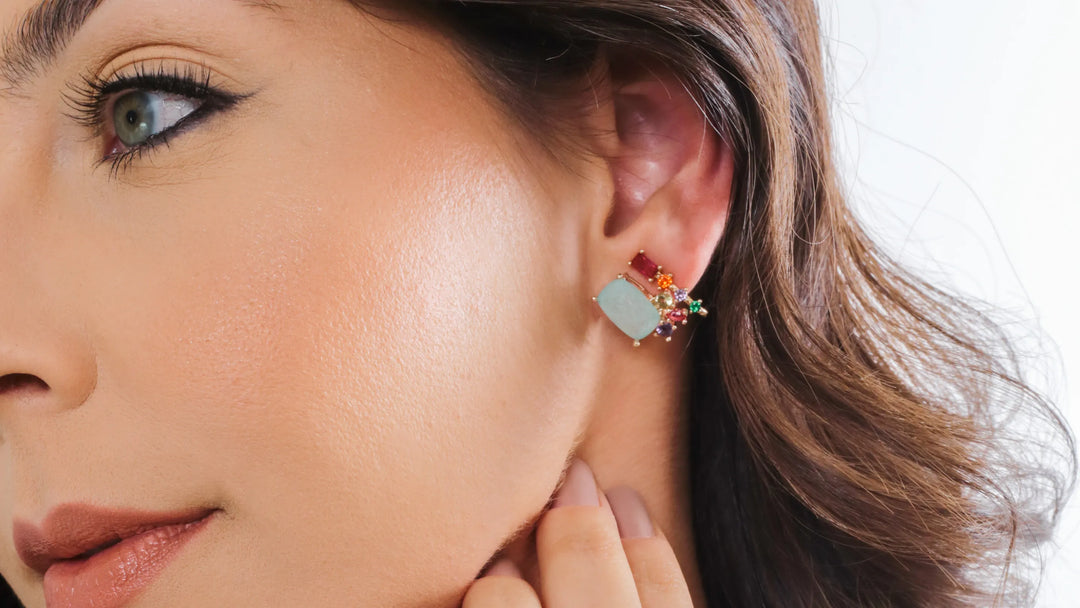 Detailed view of Elladora's vibrant fusion stone earring, showcasing intricate design and colourful gems, reflecting Brazil's rich tradition in high-quality jewellery making.