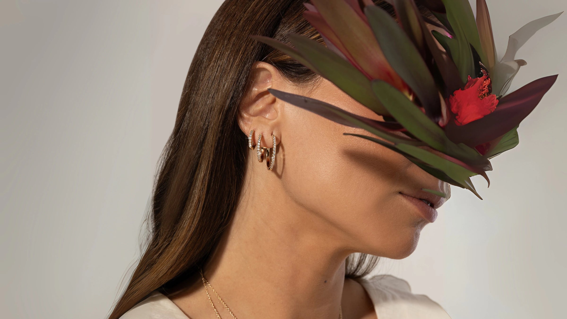An elegant woman wearing beautiful zirconia everyday hoop stack