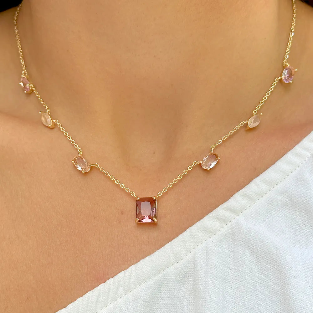  Woman wears Rhodolite, morganite and quartz crystals shapes pendante necklace 18k gold filled Elladora Store Australia