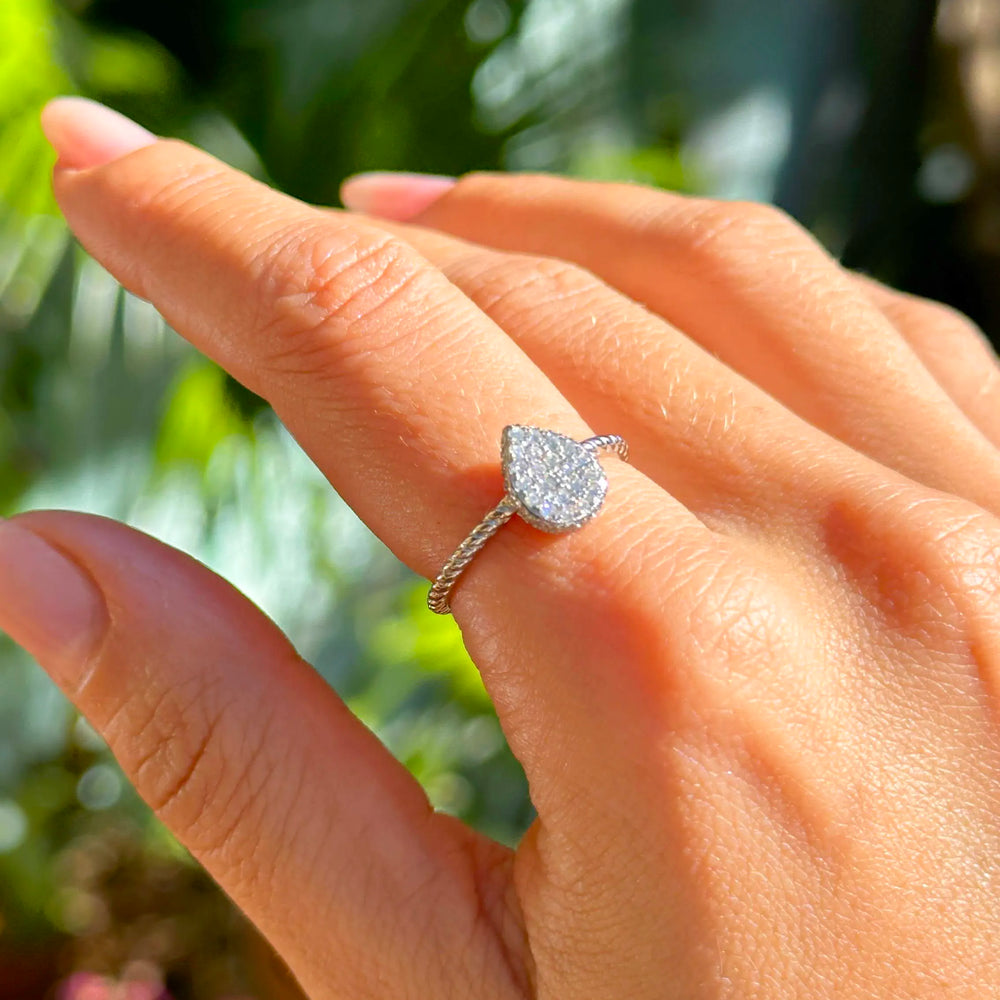 Woman wears bright drop with white cubic zirconia ring 925 Sterling Silver Elladora Store Australia 