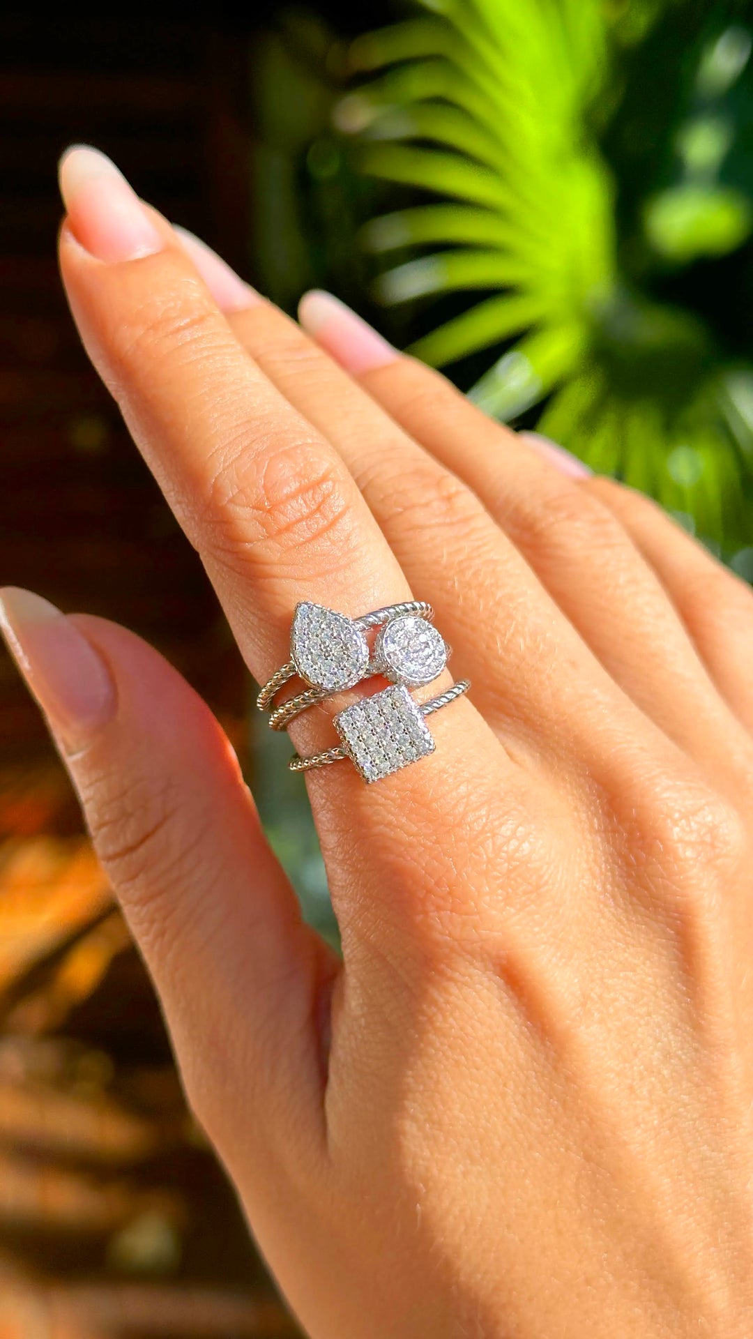 Woman wears bright drop with white cubic zirconia ring 925 Sterling Silver Elladora Store Australia 