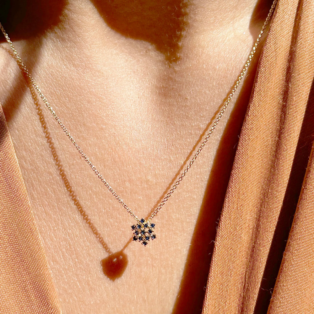 Woman wear Bright flake dark blue cubic zirconia pendant necklace 18k gold filled on copper Elladora Store Australia