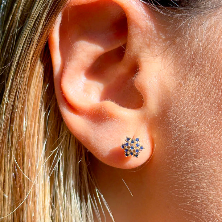 Woman wear Bright flake dark blue cubic zirconia stud earrings 18k gold filled on copper Elladora Store Australia