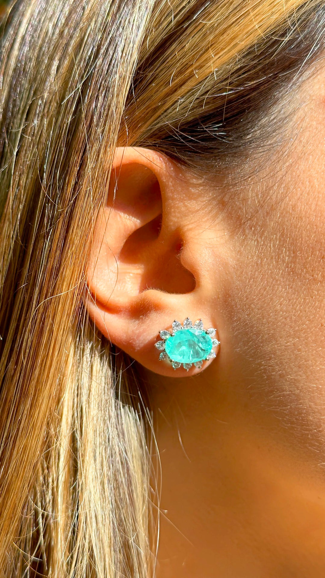 Woman wears Bright Oval Paraiba Tourmaline Fusion with white zirconia Statement Earrings, 925 Sterling Silver Elladora Store Australia