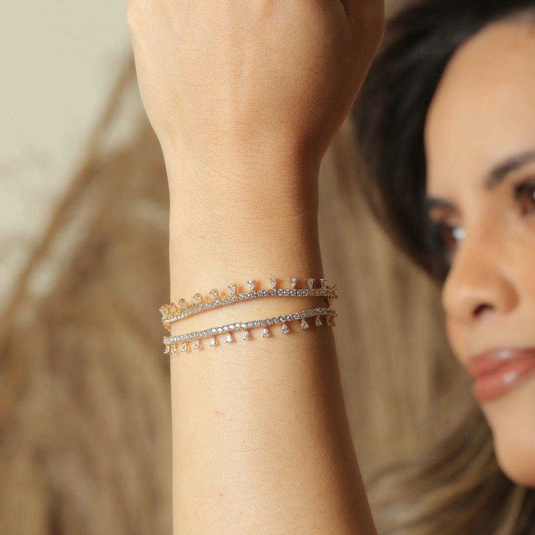 Woman wears Raindrop bracelet with white cubic zirconia 18k Gold Plated Elladora Store Australia