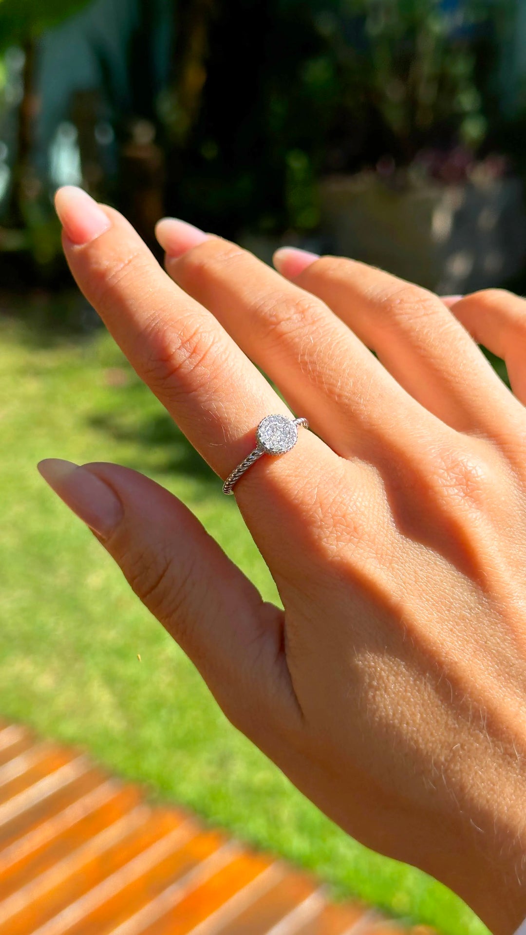 Woman wears Bright Round with White Zirconia Solitaire Ring, 925 Sterling Silver Elladora Store Australia