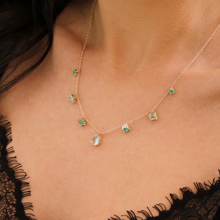 Woman wears topaz with paraiba cristal pendant necklace, 18k gold filled Elladora Store Australia