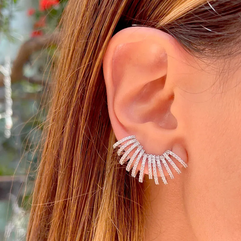 Woman wears Bright Wave with white Cubic Zirconia Statement Ear Cuff Earring, Rhodium Plated Elladora Store Australia