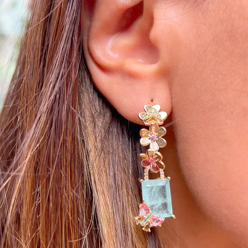 Woman wears Butterfly & Flowers, Rectangular Light Blue Tourmaline Fusion, Pink Tourmaline & Smokey Topaz Crystal Earrings, 18k Gold Filled Elladora Store Australia