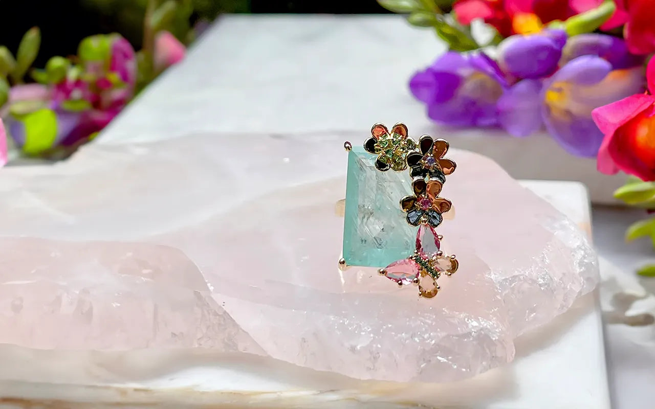 Woman wears Butterfly & Rectangular Light Blue Tourmaline Fusion, Pink Tourmaline & Smokey Topaz Crystal Fusion Ring, 18k Gold Filled Elladora Store Australia