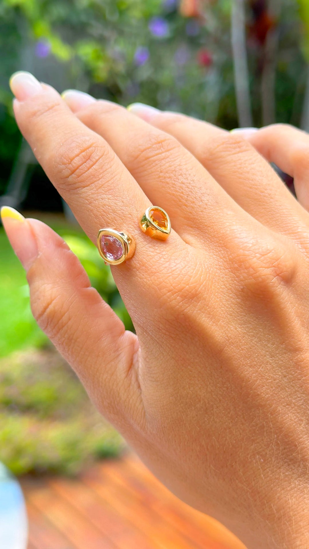 Woman wears elegant ring with citrine and tanzanite stones gold filled Elladora Store Australia.